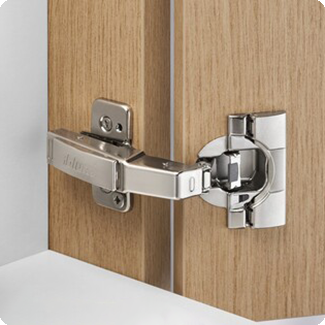 Close-up of a high-quality metal hinge attached to a wooden cabinet door, showcasing the durability and precision engineering of the hardware, essential for smooth and secure cabinet operation.